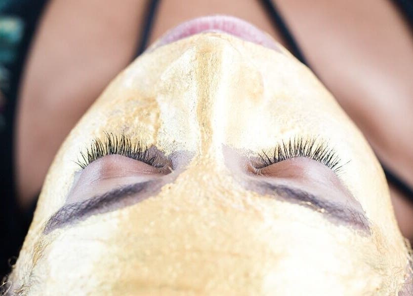 Client receives luxurious gold facial at Sage Therapeutic Soul Spa in Tahoe City, California, US.