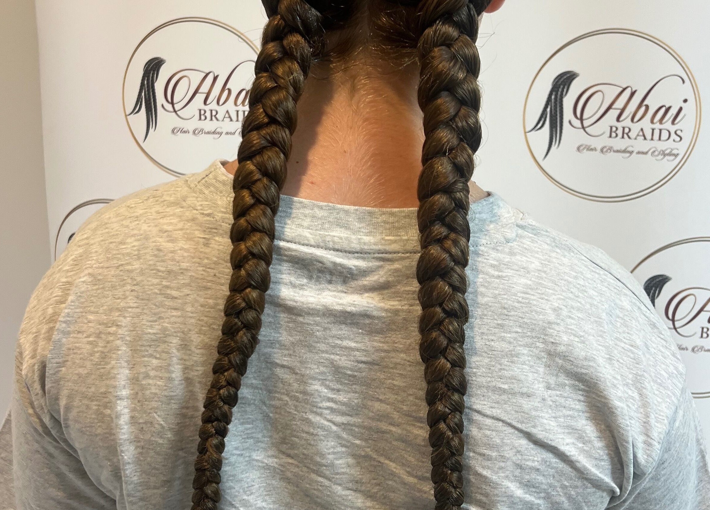 Beautiful braided hairstyle at Abai Braids, Parramatta, New South Wales, AU.