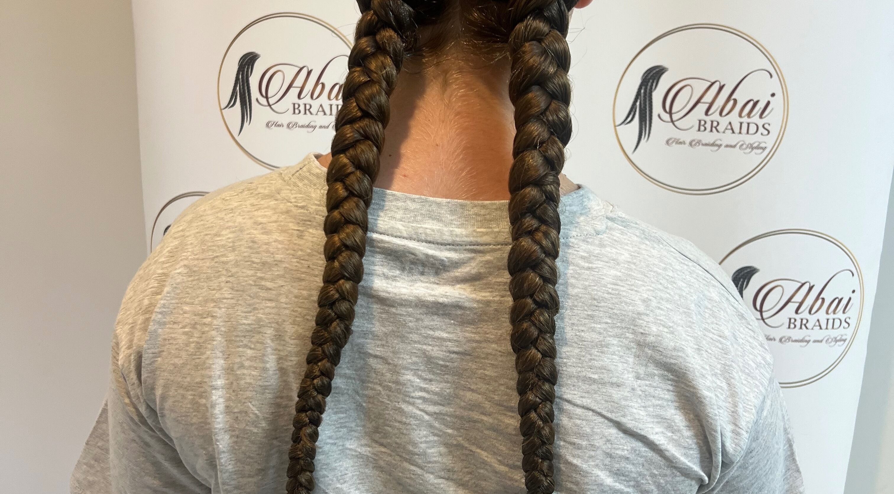 Beautiful braided hairstyle at Abai Braids, Parramatta, New South Wales, AU.