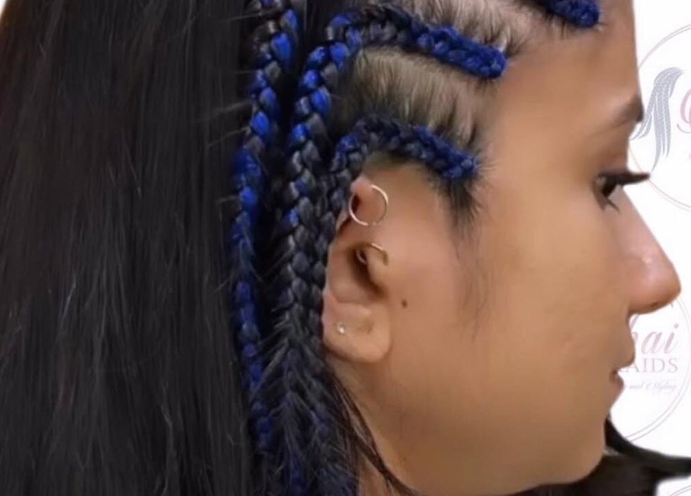 Close-up of blue braided hairstyle at Abai Braids, Parramatta, New South Wales, AU.