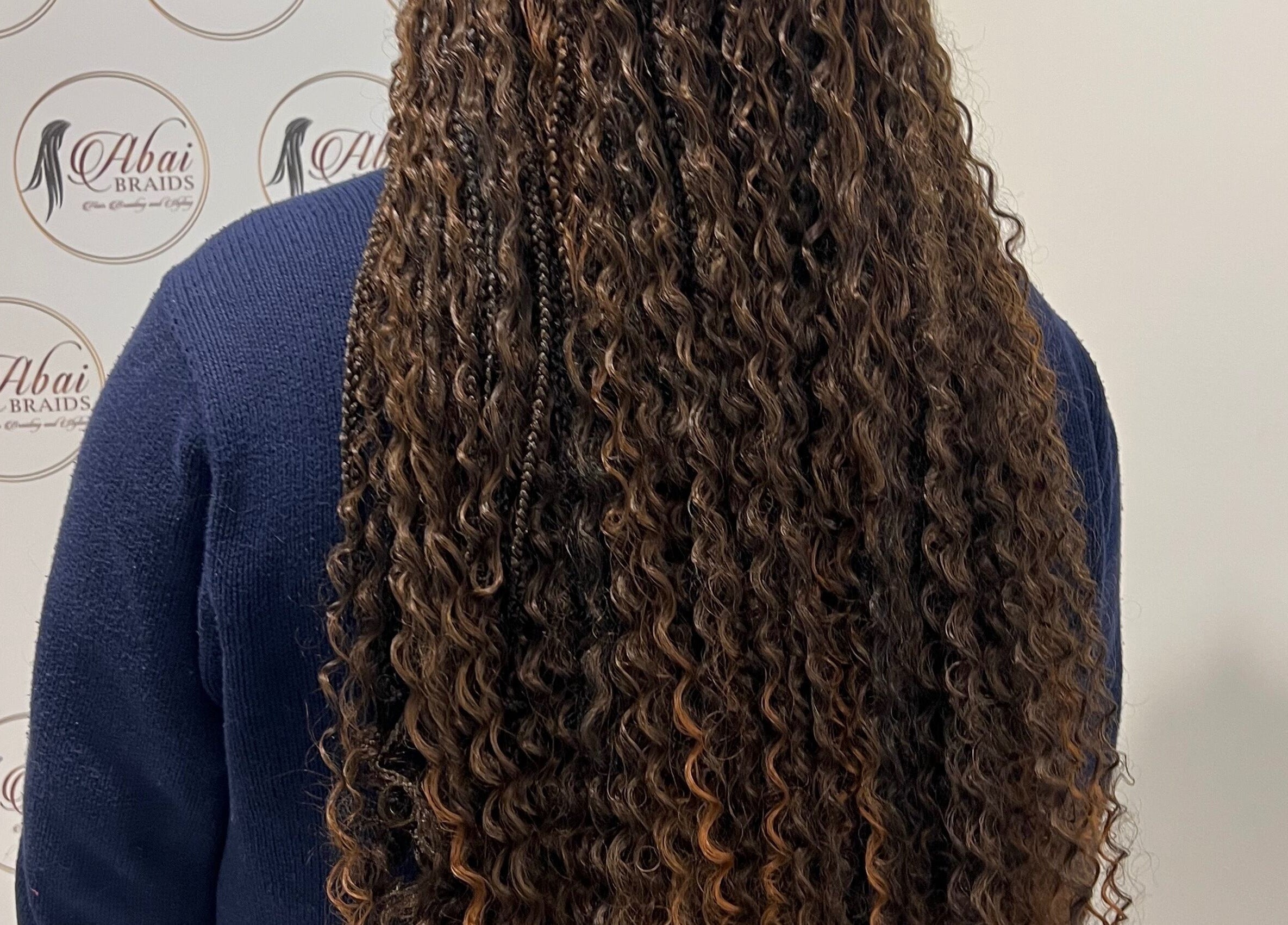 Back view of intricate curly braids at Abai Braids, Parramatta, New South Wales, AU.