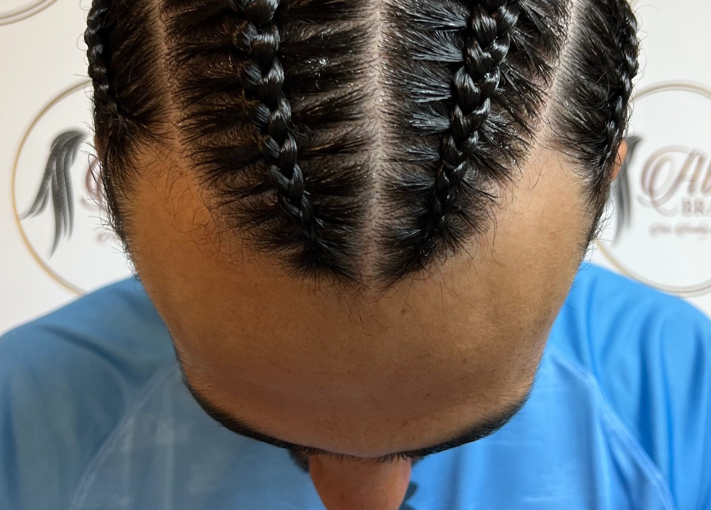 Close-up of intricate cornrow braids at Abai Braids, Parramatta, New South Wales, AU.