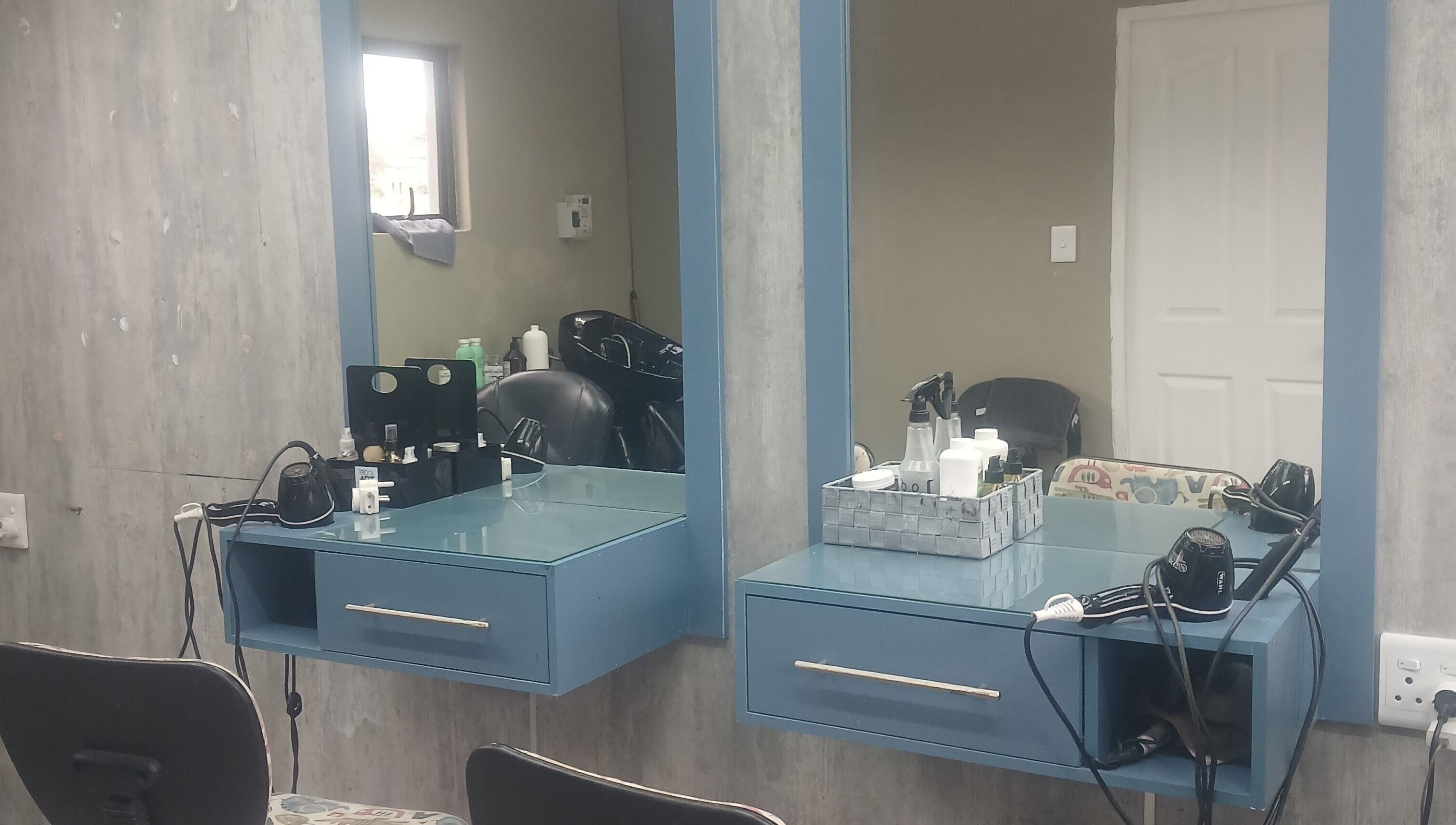 Modern styling stations at Zsquared Hair And Beauty Salon, Phoenix, Kwazulu-Natal, ZA.