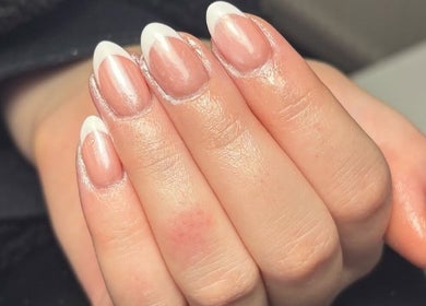 French manicure at Juicy Beauty, Gateshead, England, GB showcasing glossy nails with white tips.