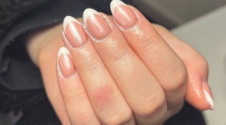 French manicure at Juicy Beauty, Gateshead, England, GB showcasing glossy nails with white tips.