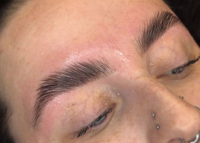 Flawlessly shaped eyebrows post-treatment at Juicy Beauty in Gateshead, England, GB.