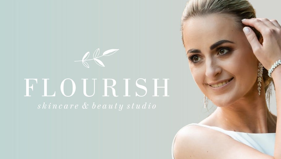 Smiling woman with jewelry at Flourish Skincare and Beauty Studio, Gqeberha, Eastern Cape, ZA