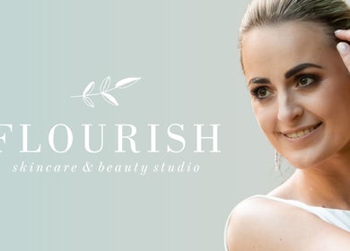 Smiling woman with jewelry at Flourish Skincare and Beauty Studio, Gqeberha, Eastern Cape, ZA