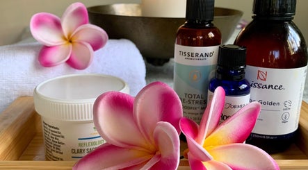 Skincare and aromatherapy products with flowers at Natalie Jane Wellbeing, Malmesbury, England, GB.