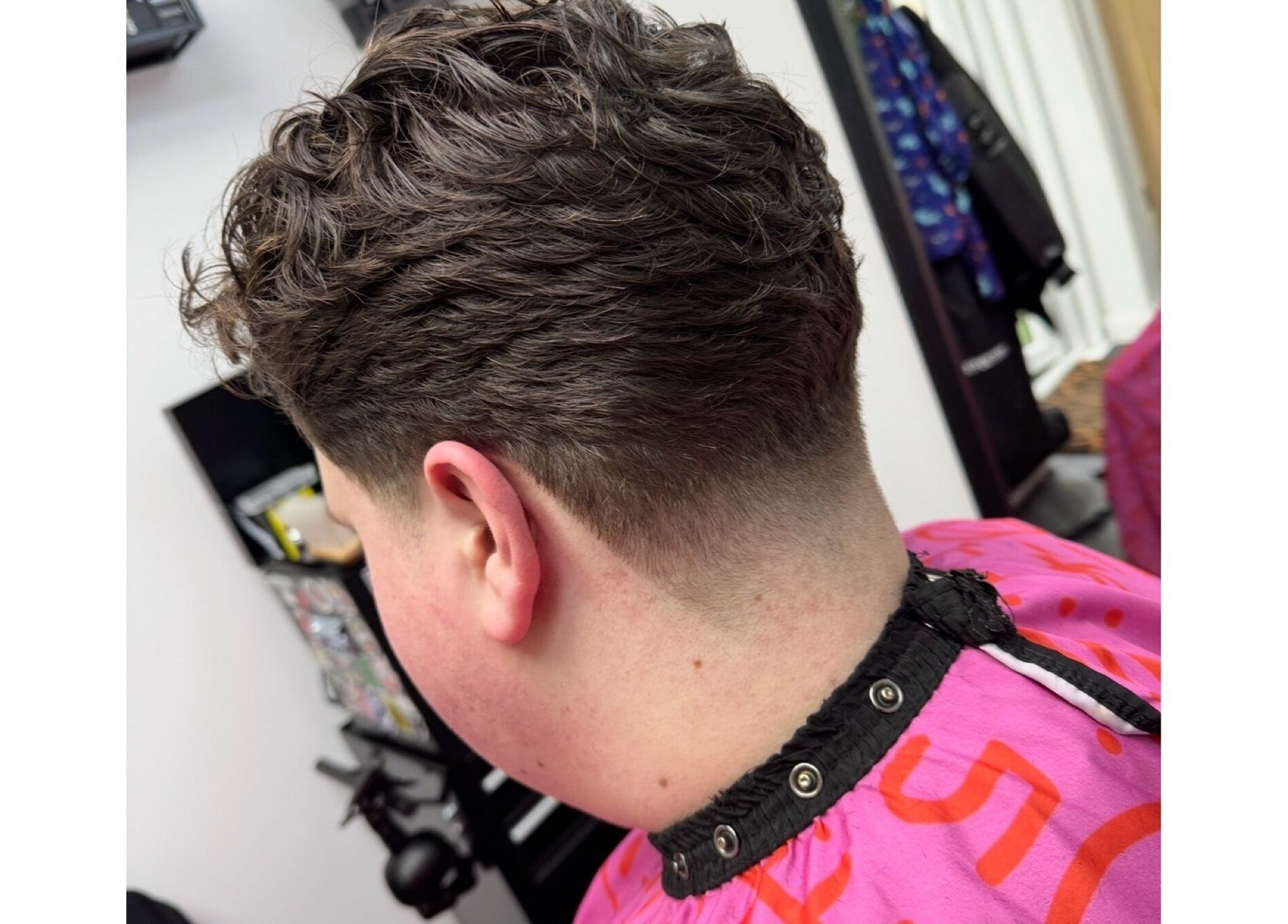 Close-up of a modern haircut at Haychs Hair Barbershop, Horsham, England, GB.