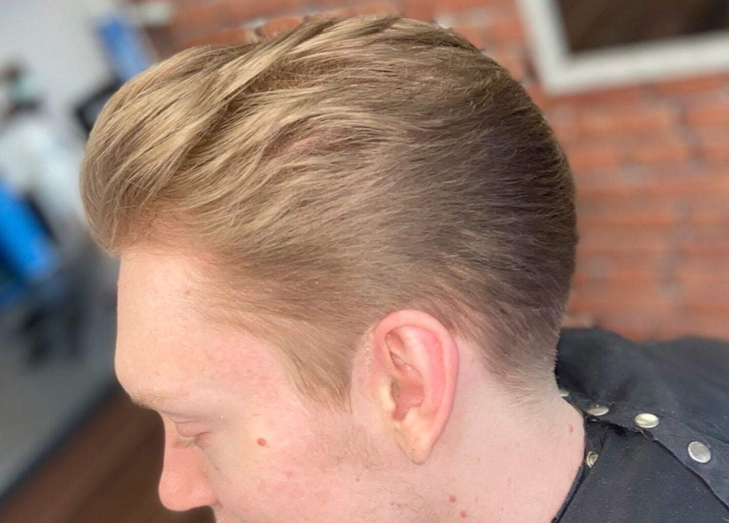Fresh haircut at Haychs Hair Barbershop, Horsham, England, GB shows sleek styling and smooth finish.