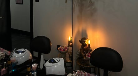 Warm lighting and decor at Nails By Georgie, Royal Tunbridge Wells, England, GB, creating a relaxing atmosphere.
