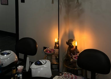 Cozy nail station at Nails By Georgie at Sacred Empire, Royal Tunbridge Wells, England, GB with warm lighting.