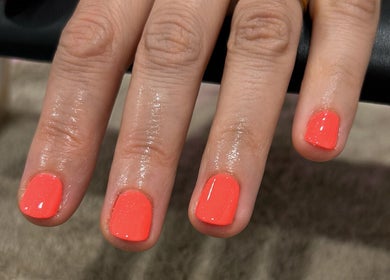 Bright coral nails at Nails By Georgie at Sacred Empire, Royal Tunbridge Wells, England, GB.