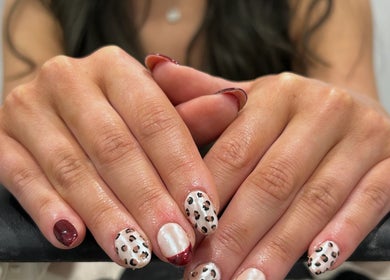 Stylish leopard nail design at Nails By Georgie at Sacred Empire, Royal Tunbridge Wells, England, GB.