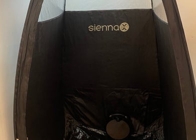 Sienna spray tan booth at The Beauty Stop, Edinburgh, Scotland, GB provides premium tanning services.
