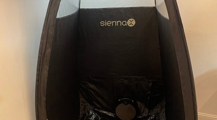 Sienna spray tan booth at The Beauty Stop, Edinburgh, Scotland, GB provides premium tanning services.