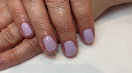 Lilac nail manicure at The Beauty Stop in Edinburgh, Scotland, GB, showcasing elegant nail art.