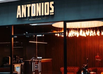 Entrance of Antonio's Signature Mriehel, featuring modern design and elegant lighting in Birkirkara, MT.