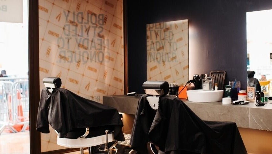 Modern styling chairs and mirrors at Antonio's Swift Cuts Campus Hub in Msida, MT.