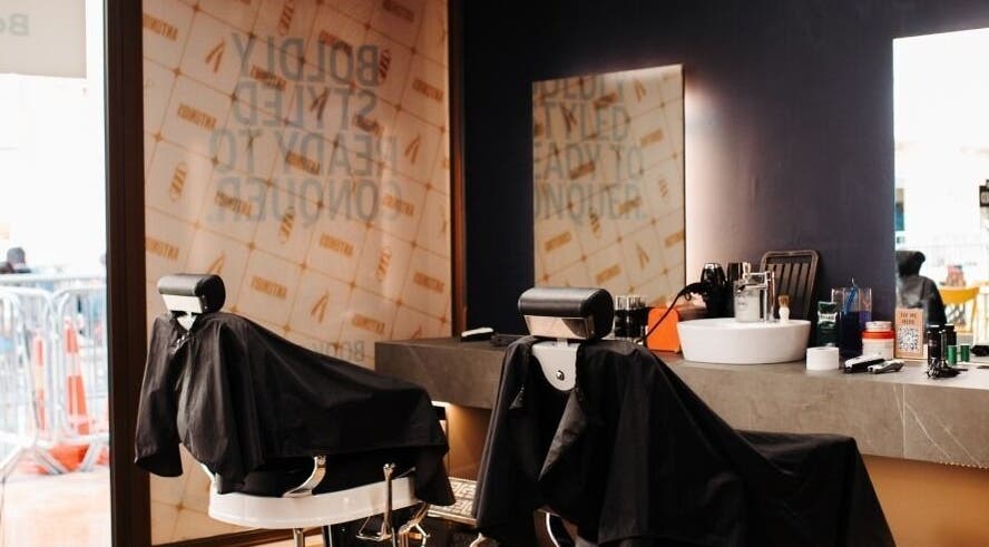 Modern styling chairs and mirrors at Antonio's Swift Cuts Campus Hub in Msida, MT.