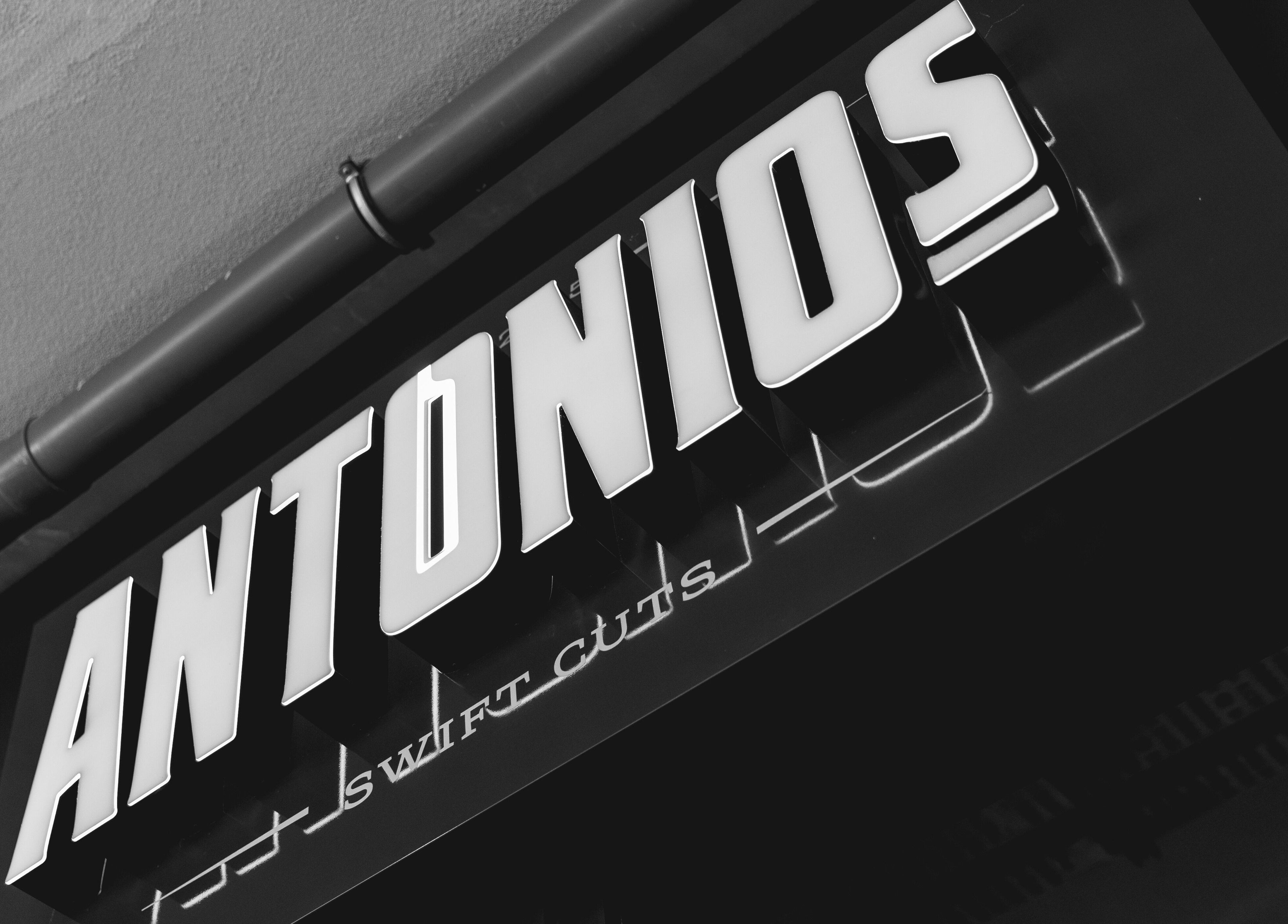 Bold signage of Antonio's Swift Cuts Campus Hub in Msida, MT capturing its modern elegance.