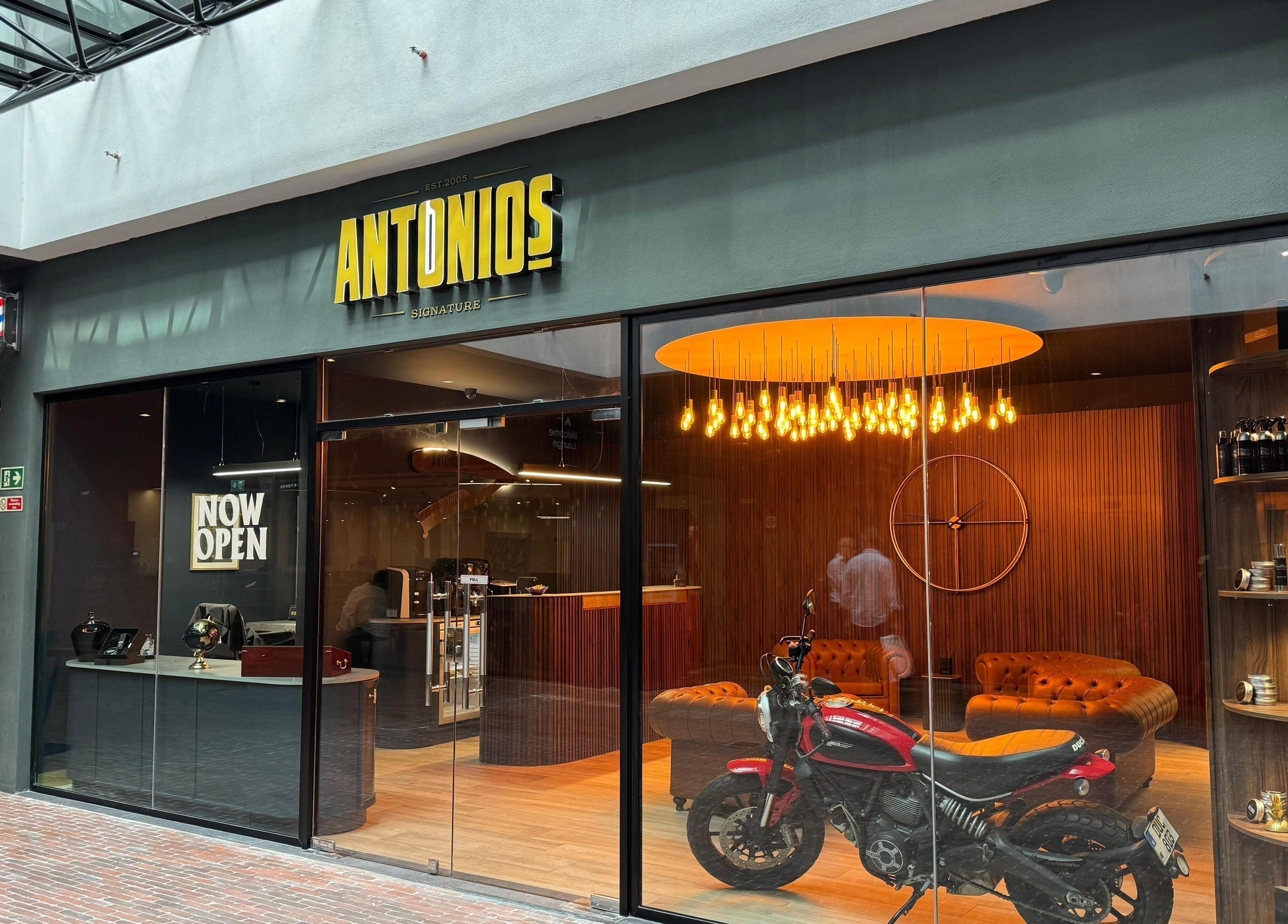 Entrance of Antonio's Signature Mriehel in Birkirkara, MT, featuring stylish decor and modern aesthetics.