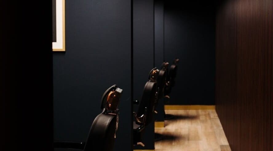 Elegant barber chairs at Antonio's Signature Mriehel in Birkirkara, MT, offer a chic and modern styling space.