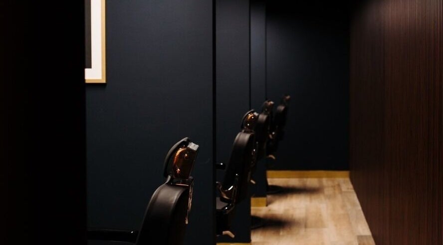 Elegant barber chairs at Antonio's Signature Mriehel in Birkirkara, MT, offer a chic and modern styling space.