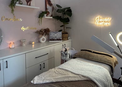Cozy skincare room at Coco Luxe Skin Aesthetics, Cape Town, Western Cape, ZA with soft lighting and aesthetic decor.