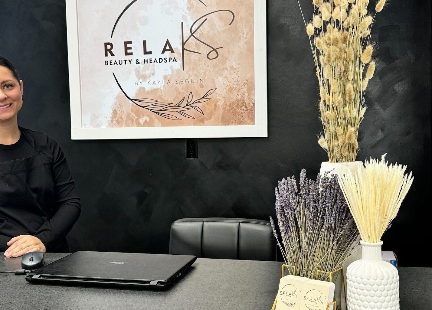 RelaKS Beauty & Headspa reception area in Temiskaming Shores, Ontario, CA with welcoming staff.