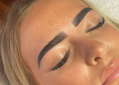 Close-up of expertly shaped brows at Georgia Grace Beauty in Berry, New South Wales, AU, highlighting skill.