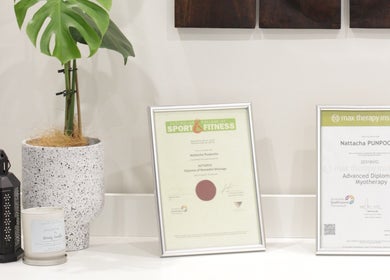 Diplomas and plant at MRL Massage & Myo Therapy, Melbourne, Victoria, AU.