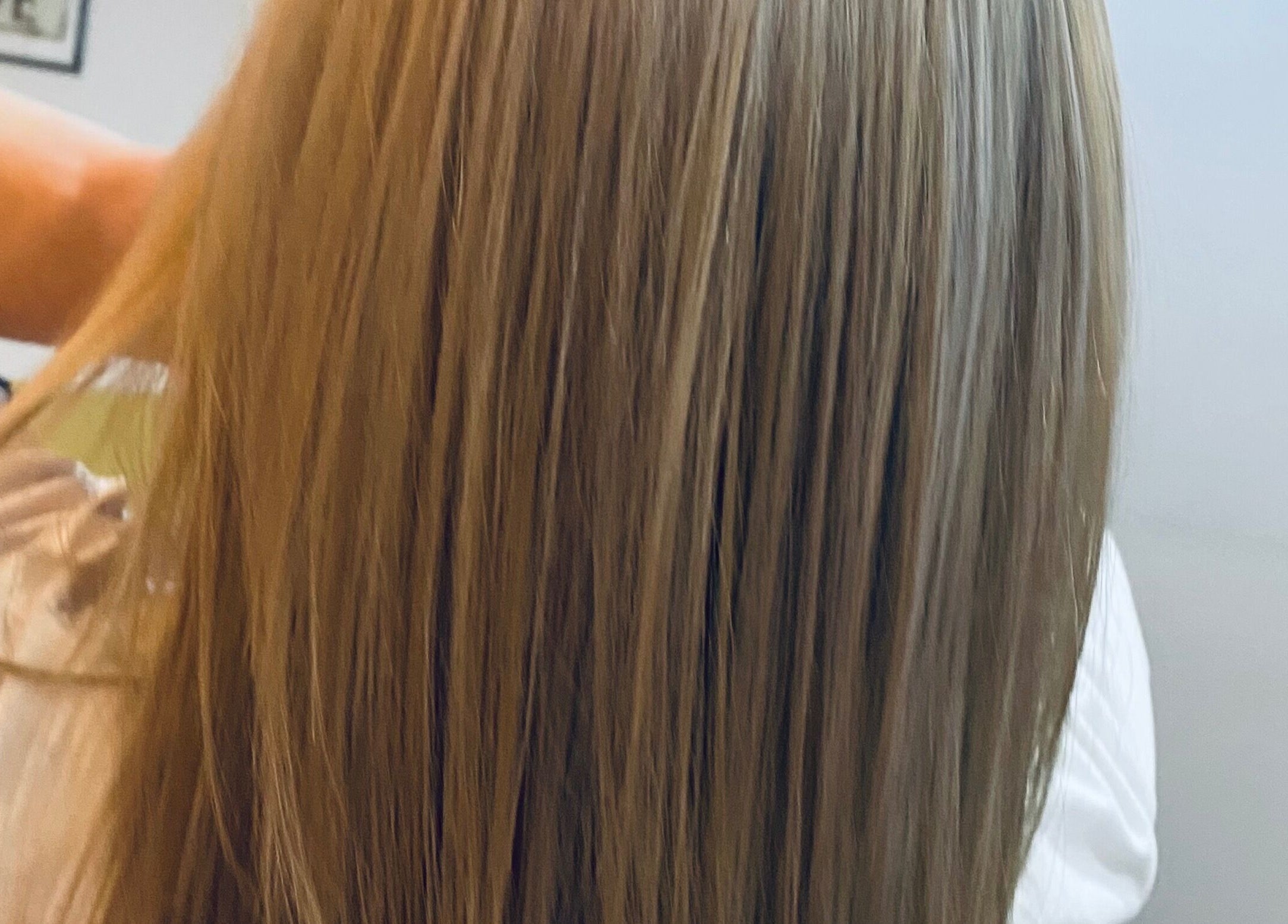 Long, straight, glossy hair showcased at HairMatters by Mariana, Feltham, England, GB.