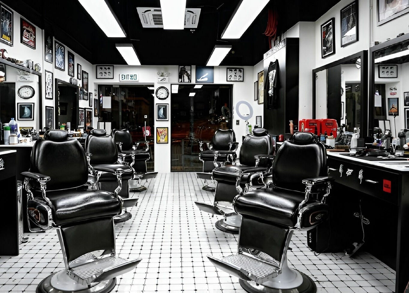Interior of EAGLES BARBER SHOP in 九龍, 九龍, HK with stylish black barber chairs and modern decor.