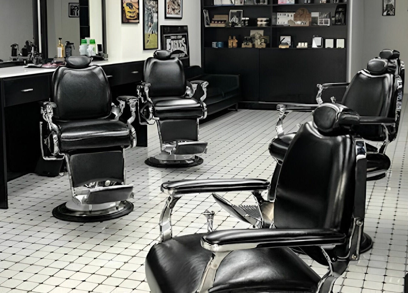 Modern interior of EAGLES BARBER SHOP in 九龍, 九龍, HK with sleek black chairs and stylish decor.