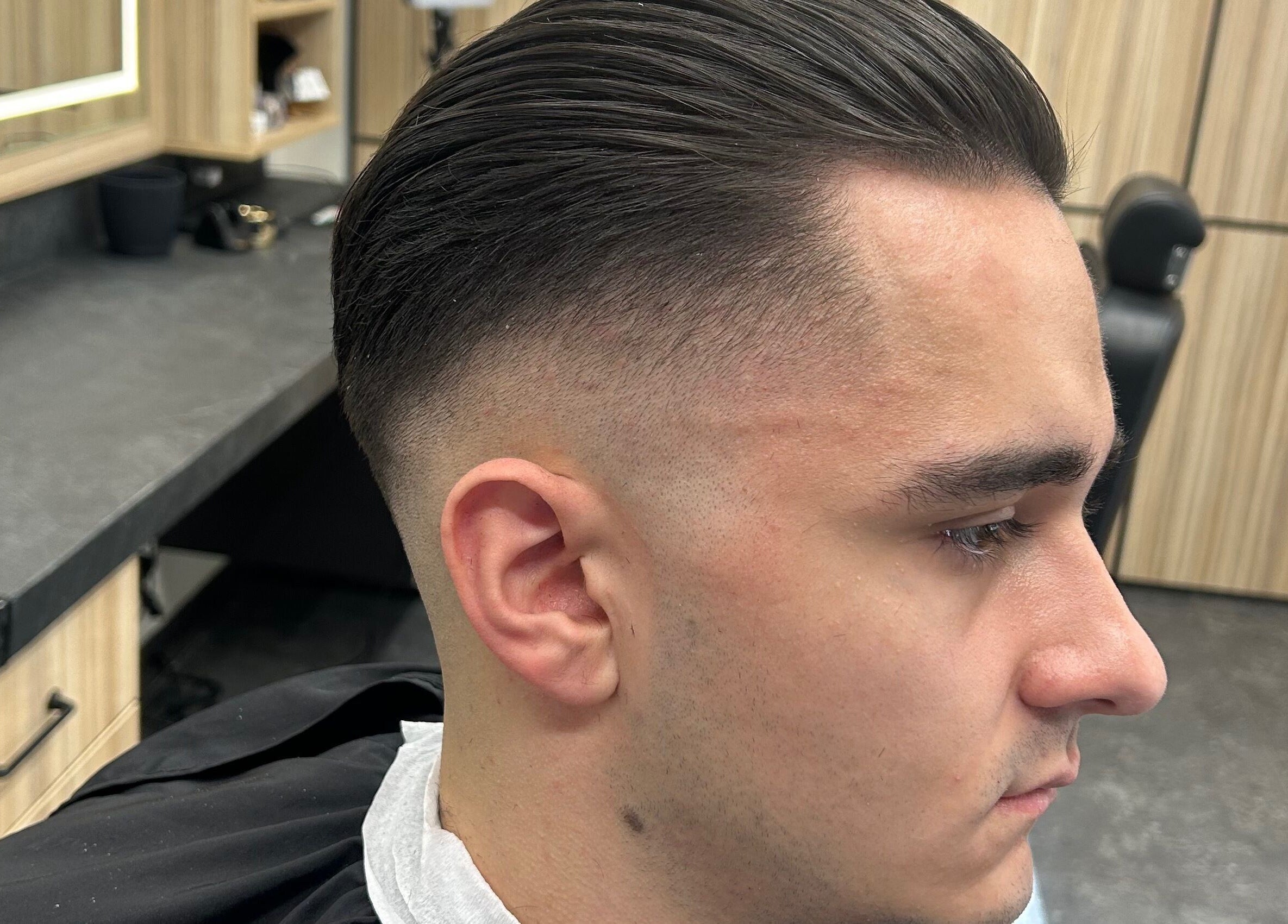 Modern sleek haircut at Galaxy Barbershop, Sofia, Sofia City Province, BG.