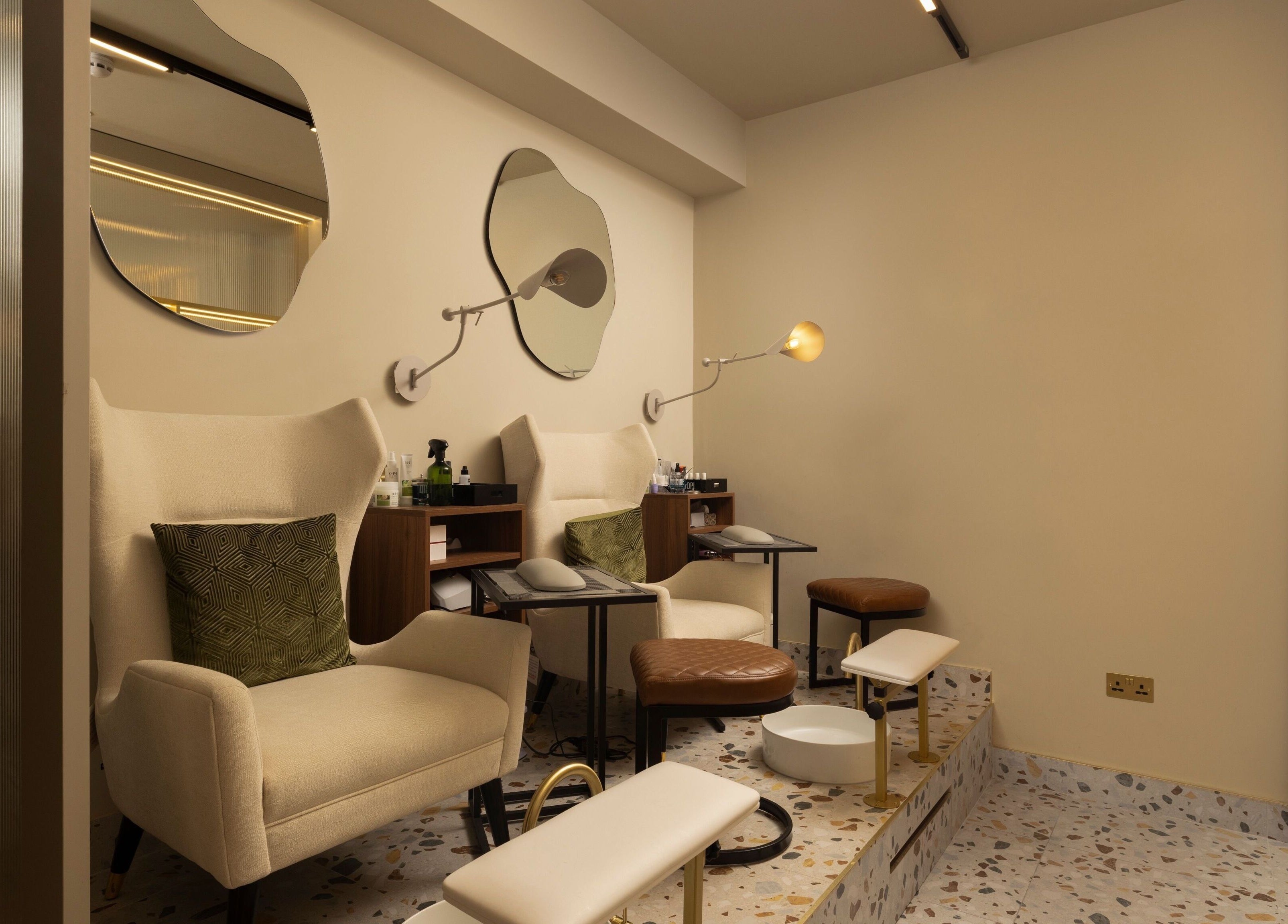 Luxurious seating at About YU, London, England, GB, in an inviting wellness setting with elegant decor.