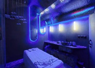 Relaxing therapy room with neon lights at Pious Therapy Center L.L.C, دبي, دبي, AE, creating a serene atmosphere.