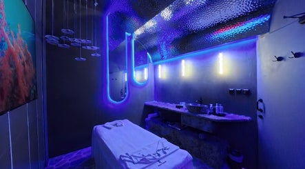 Relaxing therapy room with neon lights at Pious Therapy Center L.L.C, دبي, دبي, AE, creating a serene atmosphere.