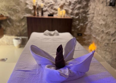 Luxurious massage table setup at Pious Therapy Center L.L.C, دبي, دبي, AE, inviting relaxation and wellness.