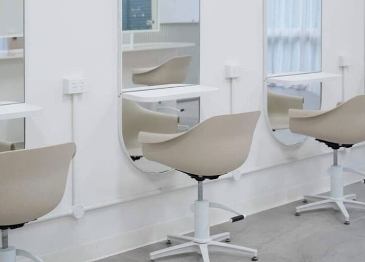 Modern salon chairs and mirrors at Indie Mane in Raymond Terrace, New South Wales, AU for beauty services.
