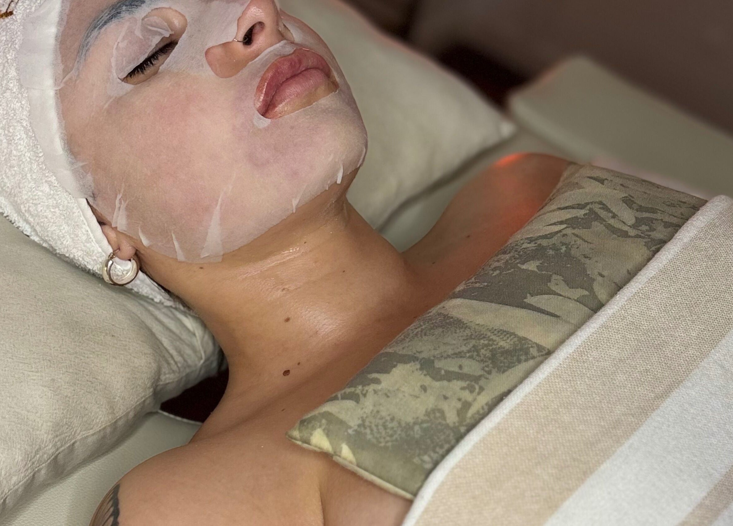 Client enjoying a rejuvenating facial at JOHANA CORBALAN ESTETIC, Buenos Aires, Ciudad Autónoma De Buenos Aires, AR.