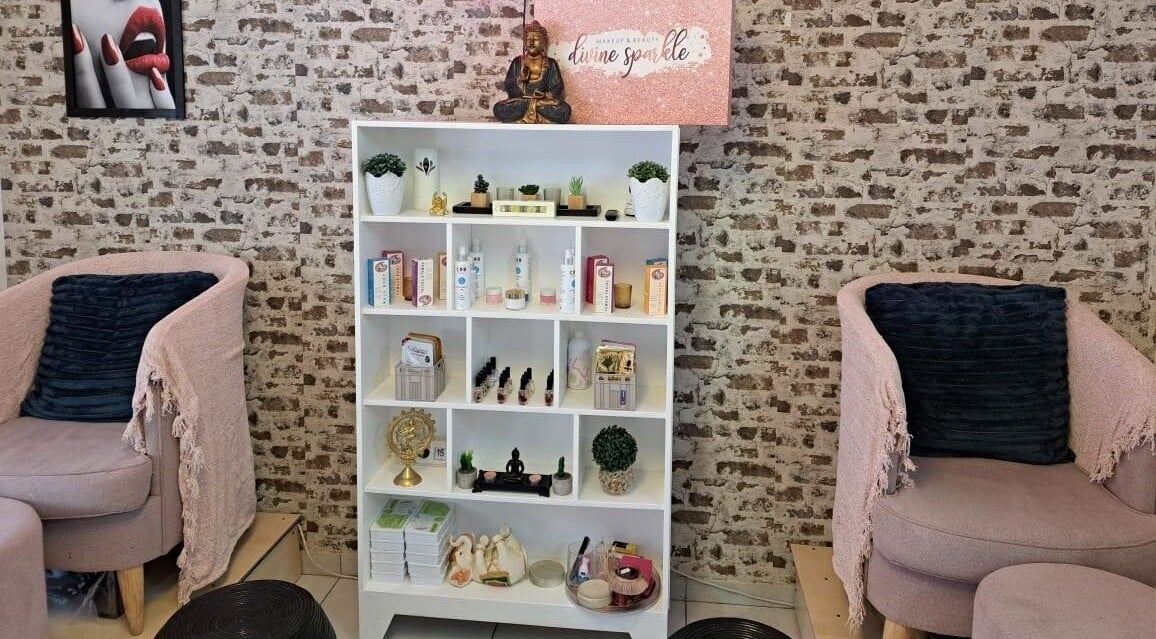 Relaxing lounge area at Divine Sparkle, Randburg, Gauteng, ZA with plush chairs and product display.