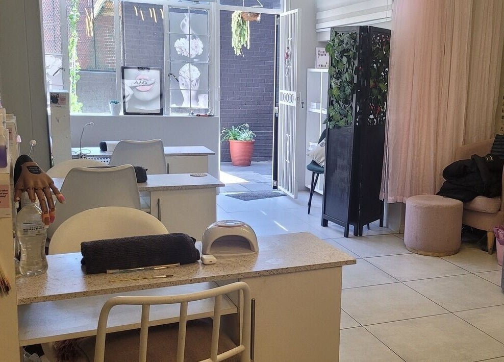 Divine Sparkle salon interior in Randburg, Gauteng, ZA showcasing a chic, calm beauty treatment area.