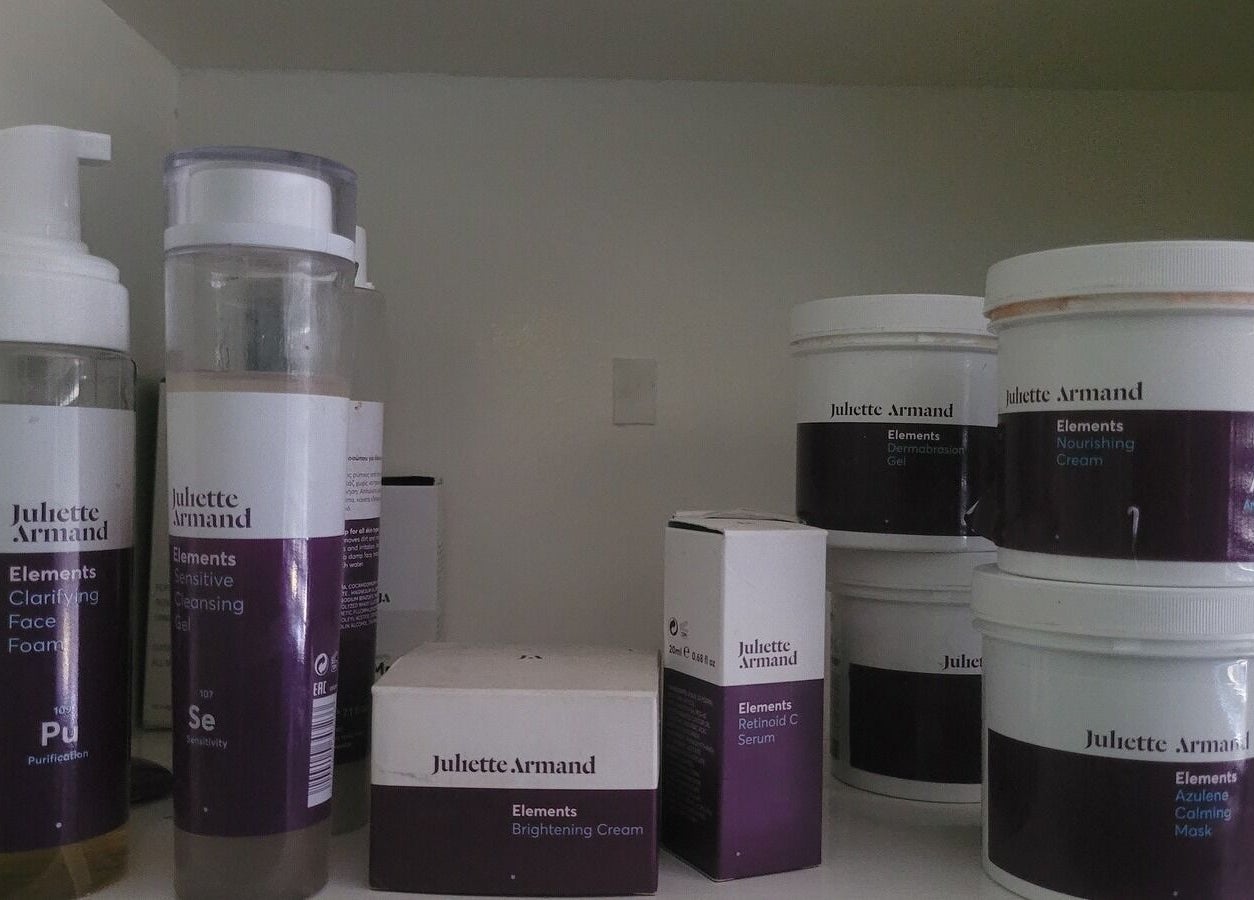 Assorted skincare products on a shelf at Divine Sparkle, Randburg, Gauteng, ZA, featuring Juliette Armand line.