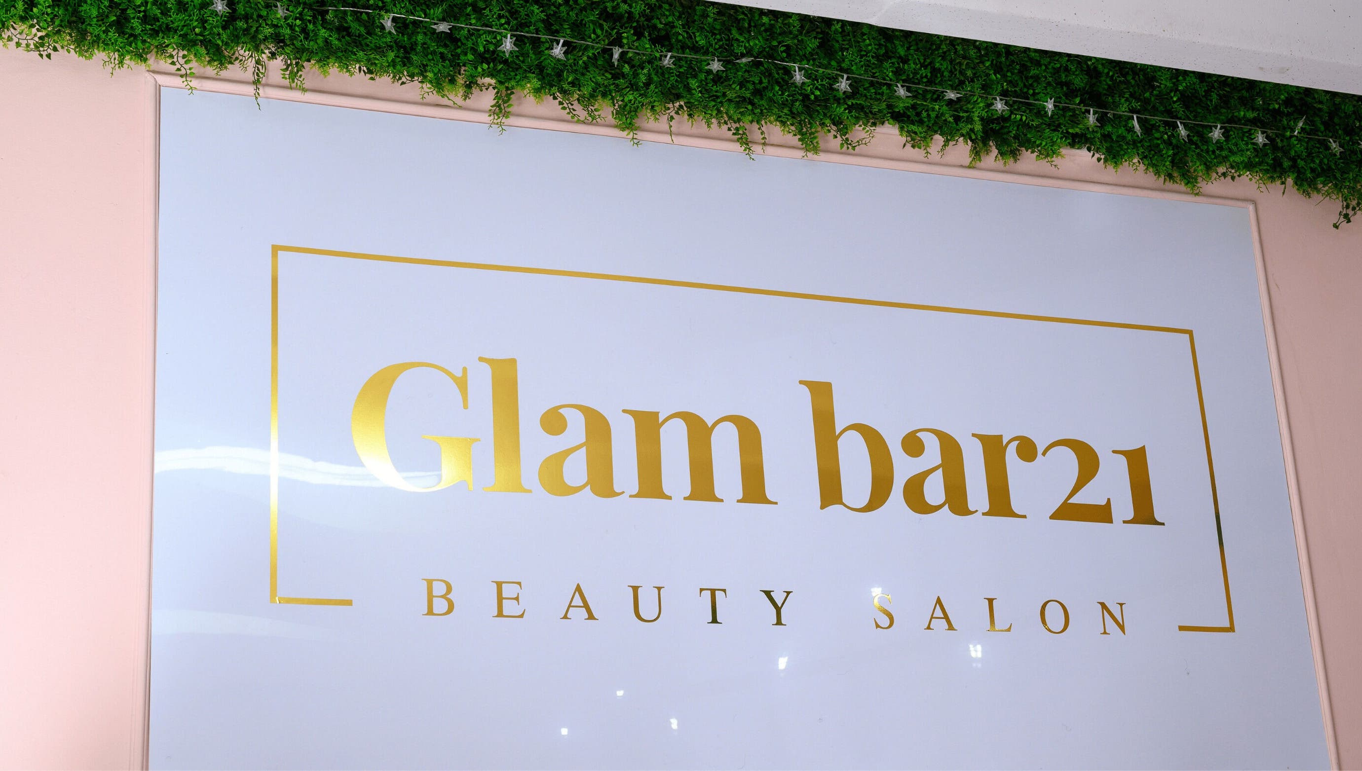 Elegant Glam Bar21 sign with lush greenery, located in Howick, Kwazulu-natal, ZA.