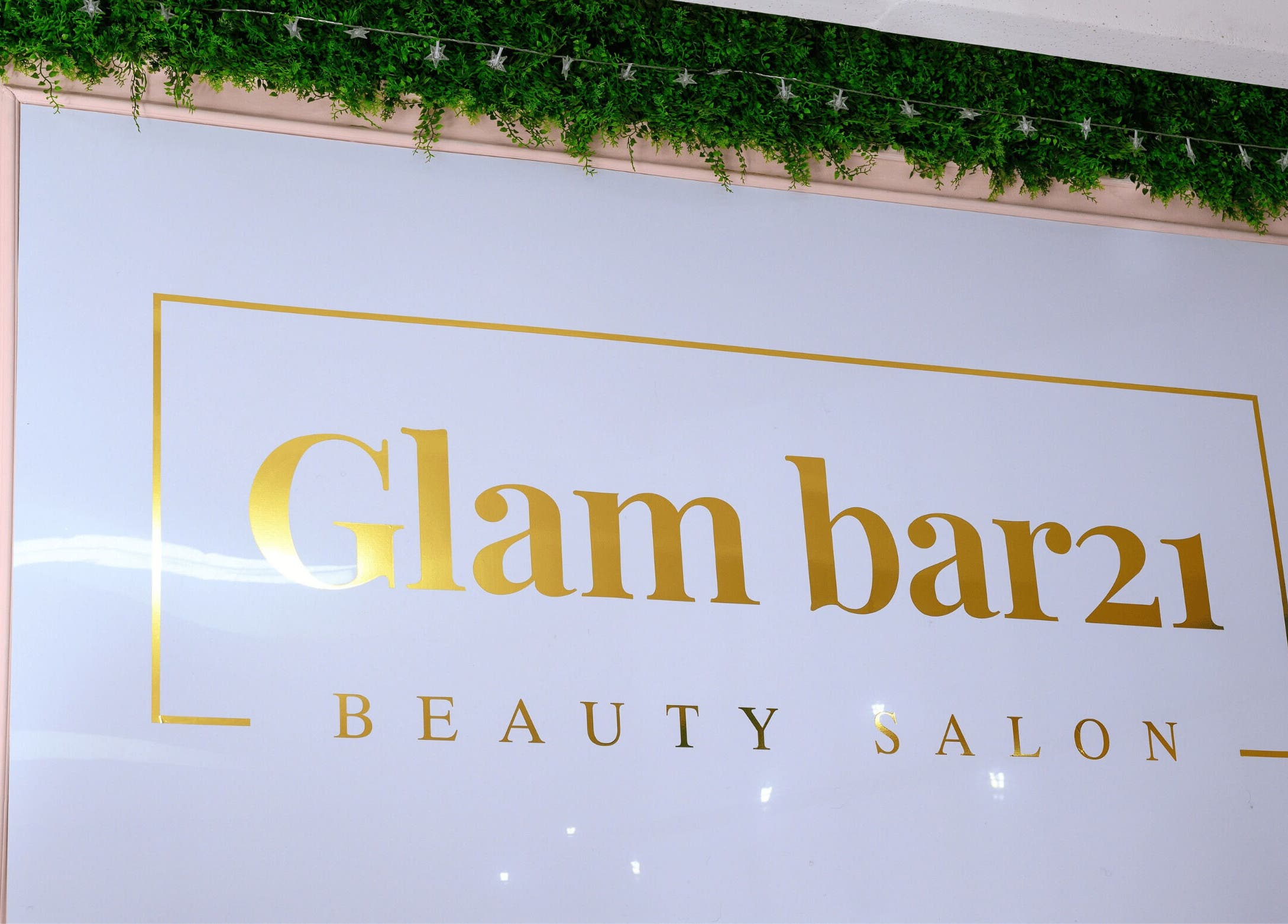 Elegant Glam Bar21 sign with lush greenery, located in Howick, Kwazulu-natal, ZA.