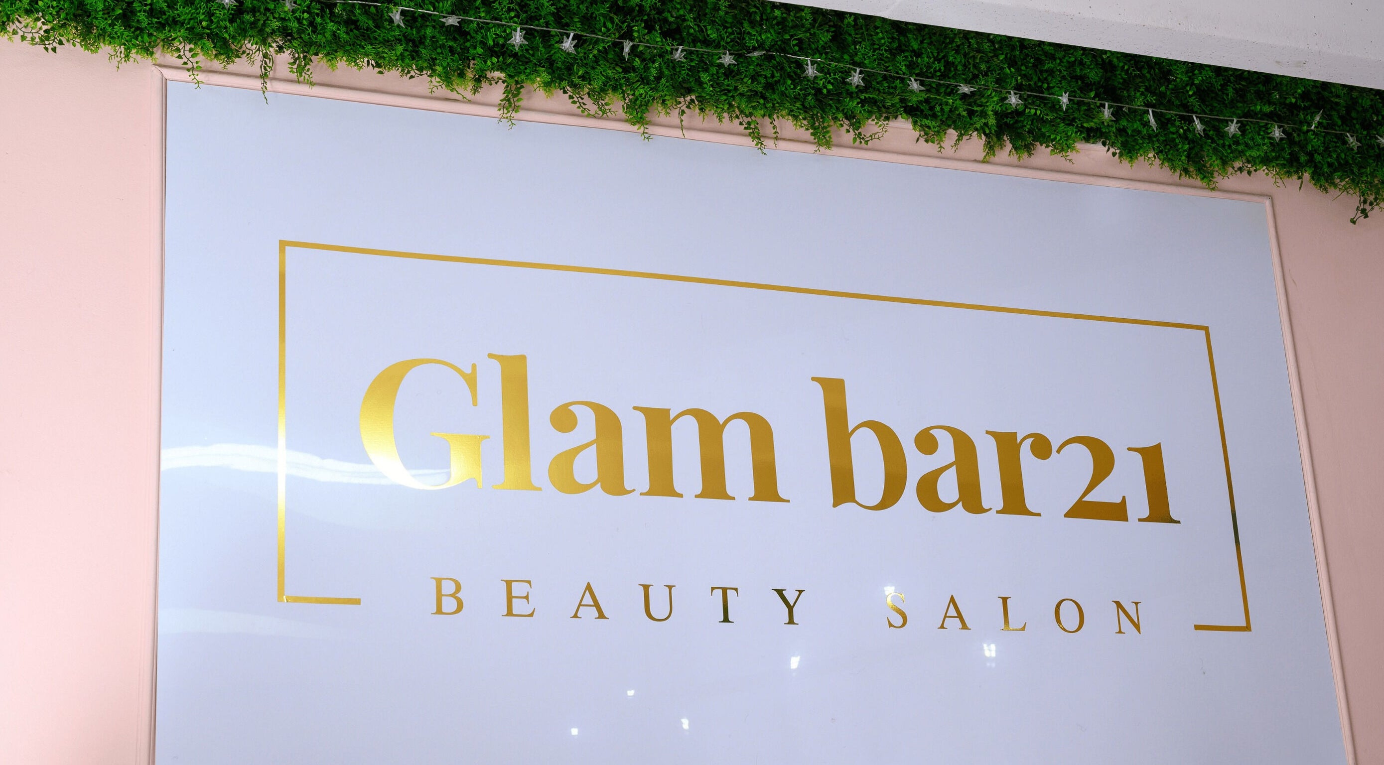 Elegant Glam Bar21 sign with lush greenery, located in Howick, Kwazulu-natal, ZA.