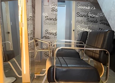 Modern salon chairs at Sandrea Salon Parañaque in Parañaque, Metro Manila, PH, offering stylish beauty services.